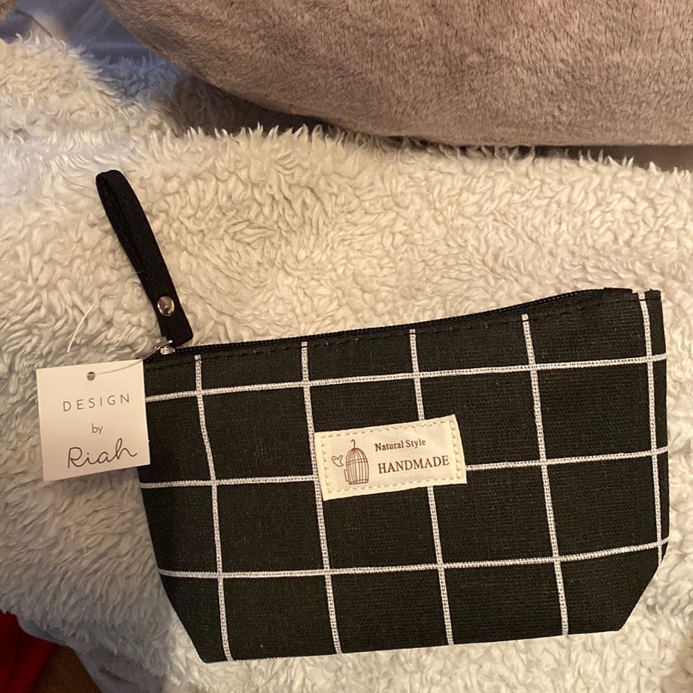 Wristlet Pouch by Riah Fashion